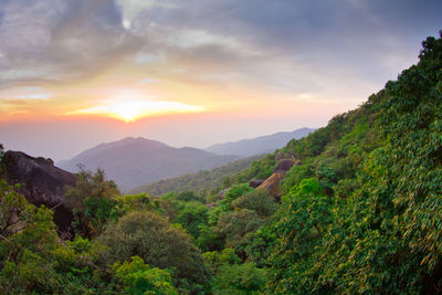 Scenic view of mountains against sky during sunset