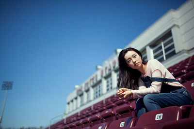 Portrait of young woman outdoors