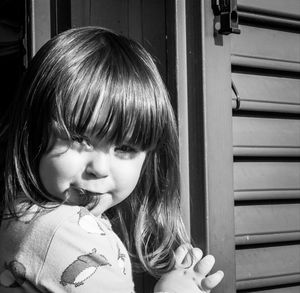 Portrait of cute girl looking down