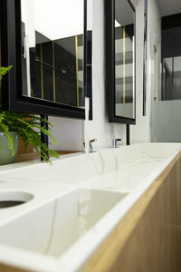 Reflection of glass on table at home