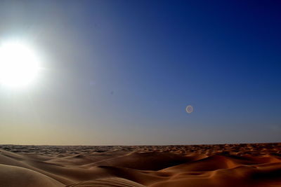 Scenic view of desert against clear sky