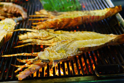 Close-up of meat on barbecue grill