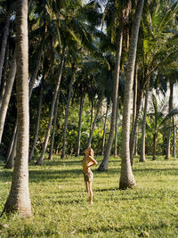 Girl in the jungle somewhere in nusa lembongan, indonesia. shot on 35mm kodak portra 400 film.