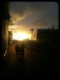 Silhouette of buildings at sunset