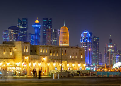 Illuminated buildings at night