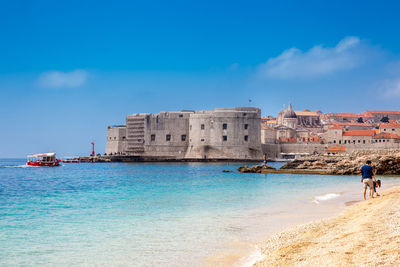 The beautiful banje beach and dubrovnik city