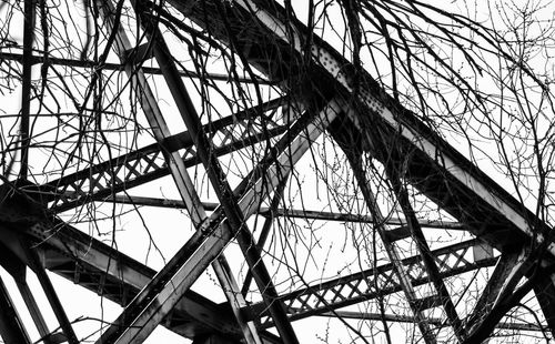 Low angle view of ferris wheel against sky