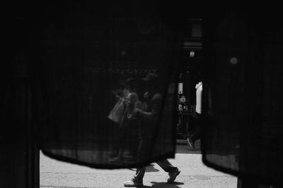 People walking on street in city