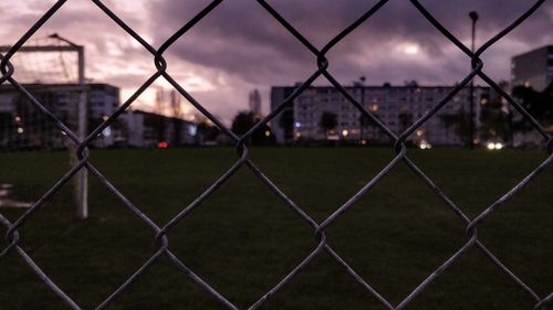 Field seen through chainlink fence