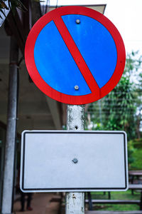 Close-up of blank road signs in city