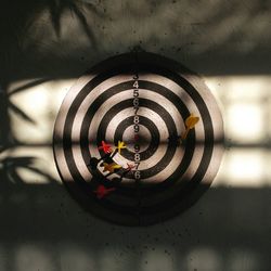 View of darts in dartboard