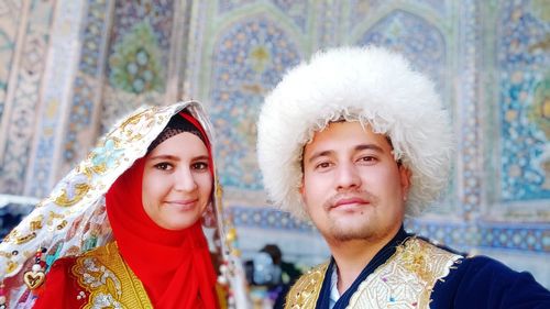 Portrait of smiling young woman wearing hijab