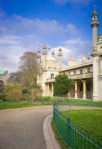 View of historical building against cloudy sky in brighton