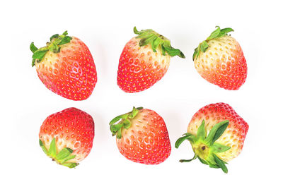 Close-up of fruits against white background