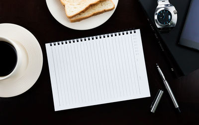 High angle view of paper on table
