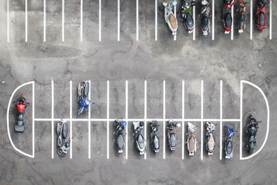 Directly above shot of vehicles parked at parking lot