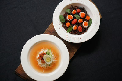 High angle view of fruits in bowl on table