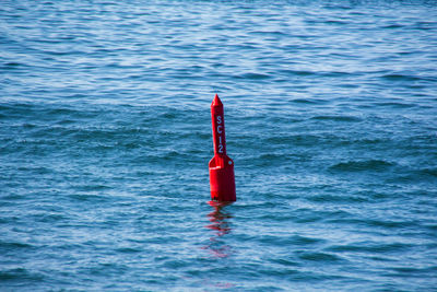 Red floating on water