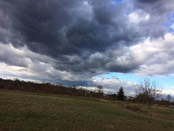 Storm clouds over landscape