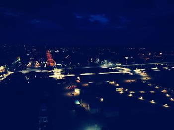 Illuminated cityscape at night