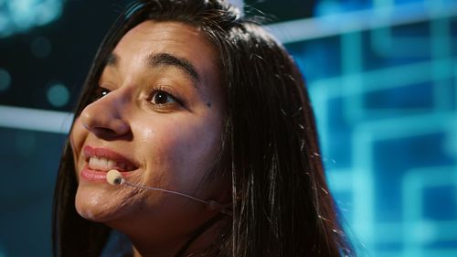 Close-up of young woman looking away