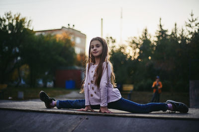 Portrait of woman sitting outdoors