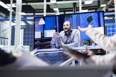 Business colleagues working in office