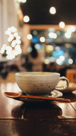 Close-up of coffee cup on table