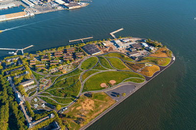 High angle view of sea and cityscape