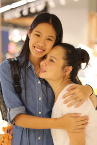 Portrait of happy mother with baby