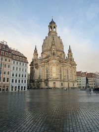 View of buildings in city against sky