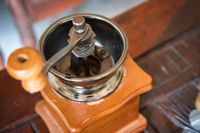 High angle view of old machinery on table