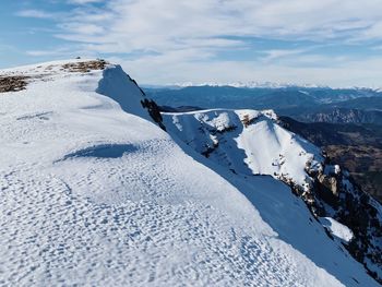 View of snow covered mountain against sky