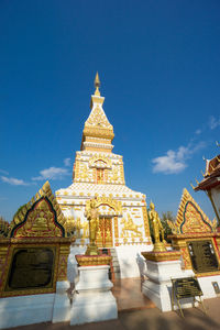 Low angle view of temple against building