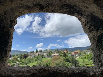 Panoramic view of old town by buildings against sky