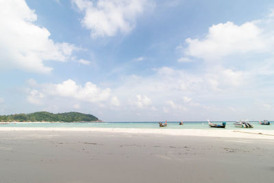 Scenic view of beach against sky