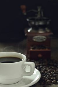 Close-up of coffee cup on table