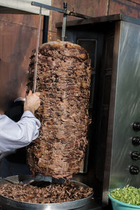 Man preparing food at store