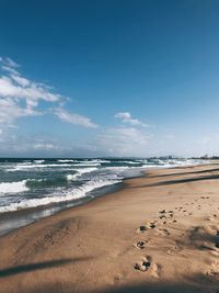 Scenic view of beach against sky