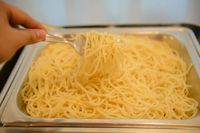 Close-up of person preparing food