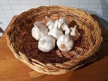 High angle view of eggs in basket on table