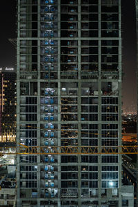 Illuminated buildings in city at night