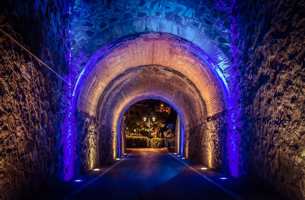 the way forward, tunnel, arch, diminishing perspective, indoors, architecture, illuminated, built structure, vanishing point, archway, empty, narrow, long, transportation, corridor, night, road, light at the end of the tunnel, walkway, lighting equipment