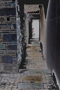 Narrow alley along buildings