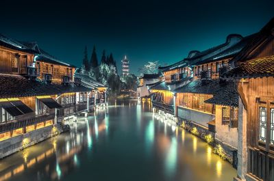 View of illuminated buildings at night