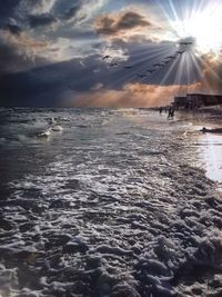 Scenic view of sea at sunset