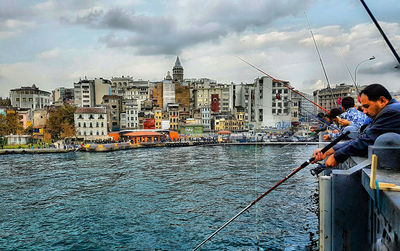 Man with cityscape in background