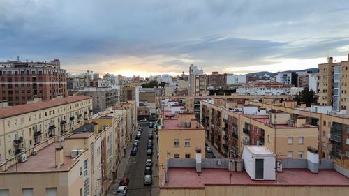 High angle view of buildings in city against sky