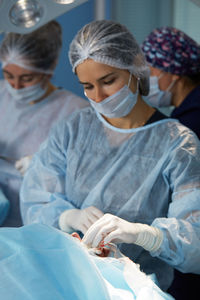 Doctor examining patient in hospital