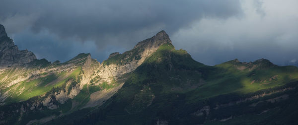 Panoramic view of mountains against sky